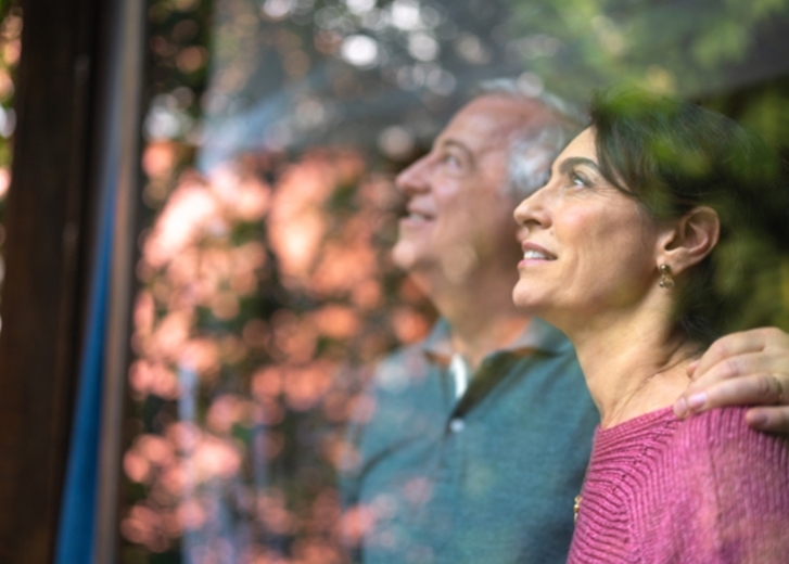 couple looking out window